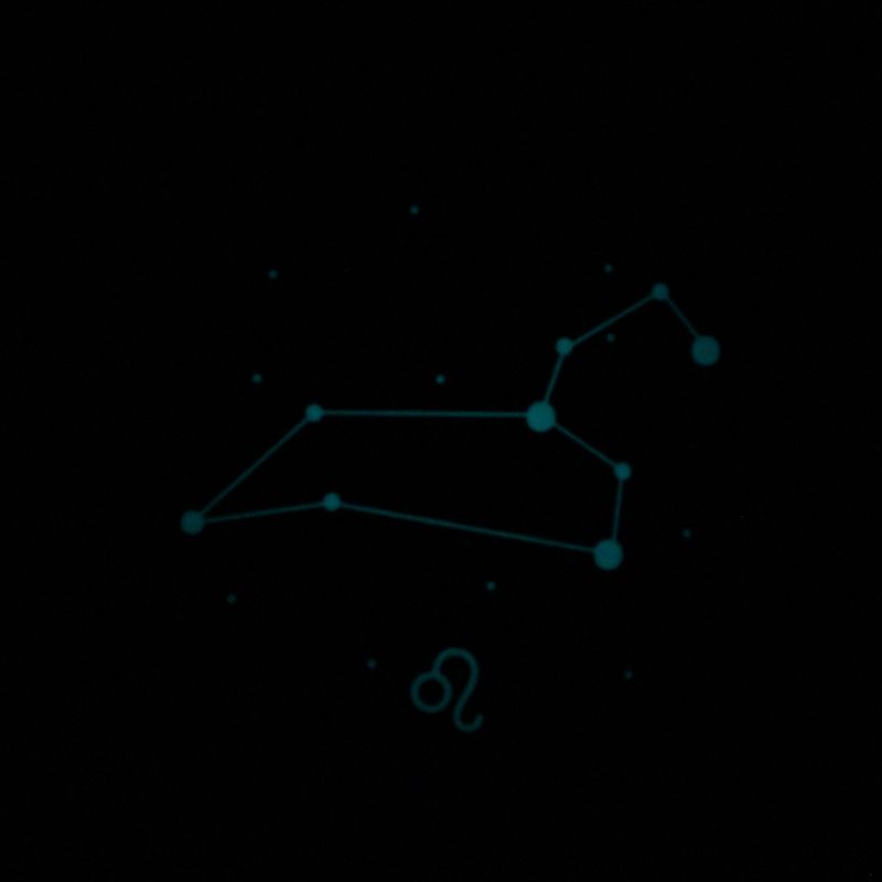 Leo piece glowing blue in the dark