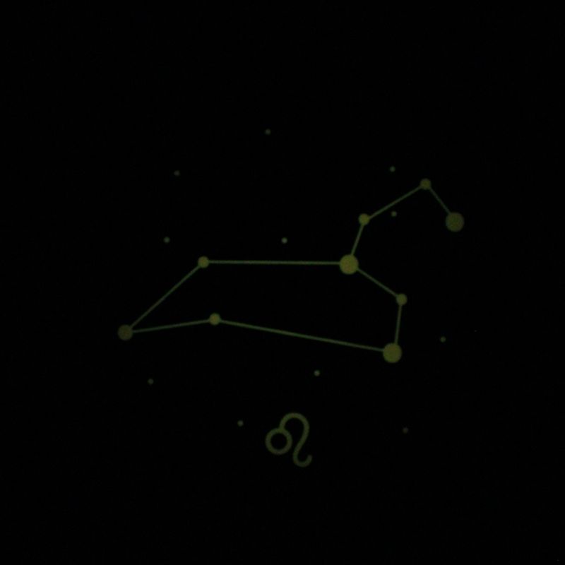 Leo piece glowing pink in the dark